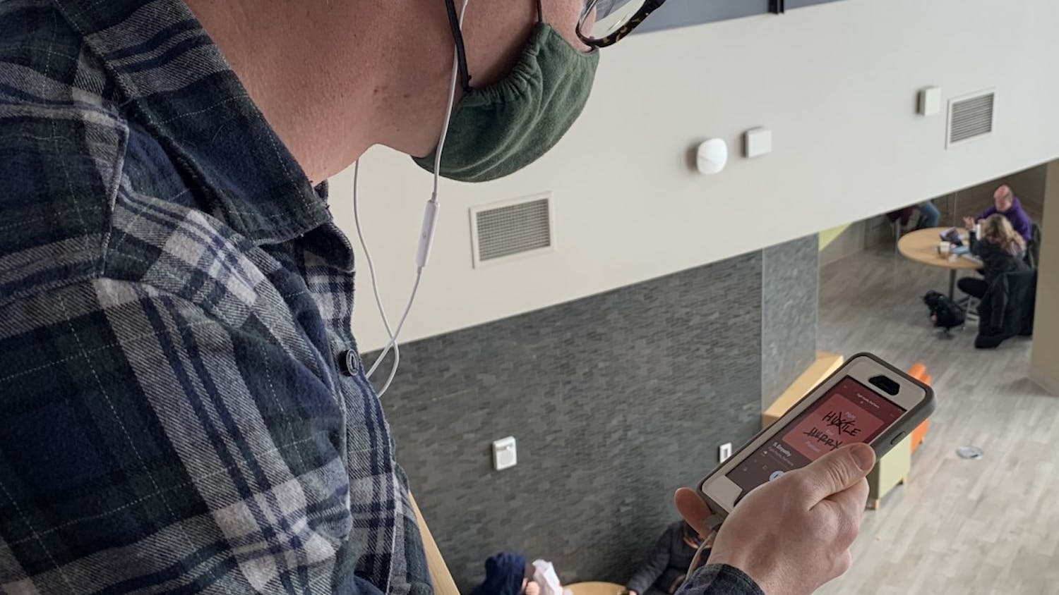 Senior Nathan Rohwer listening to a podcast.jpg