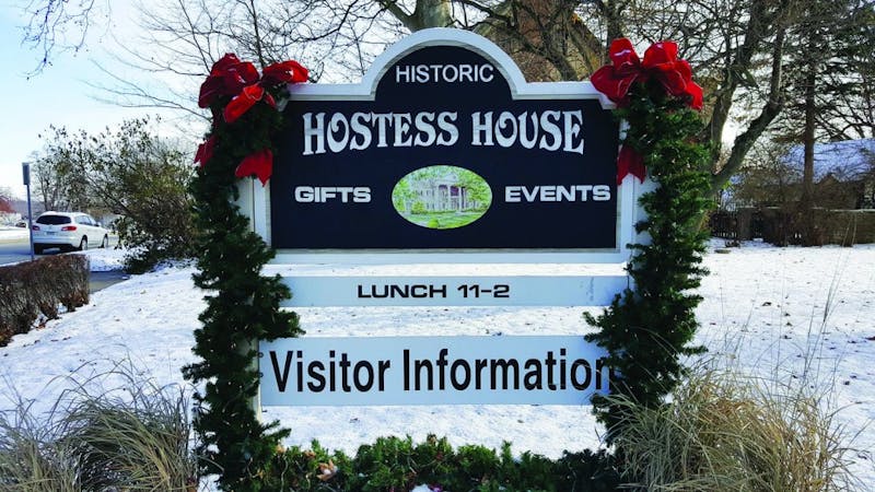 The sign out front flaunts garlands and bows for the holiday season. (Photograph provided by Hostess House)