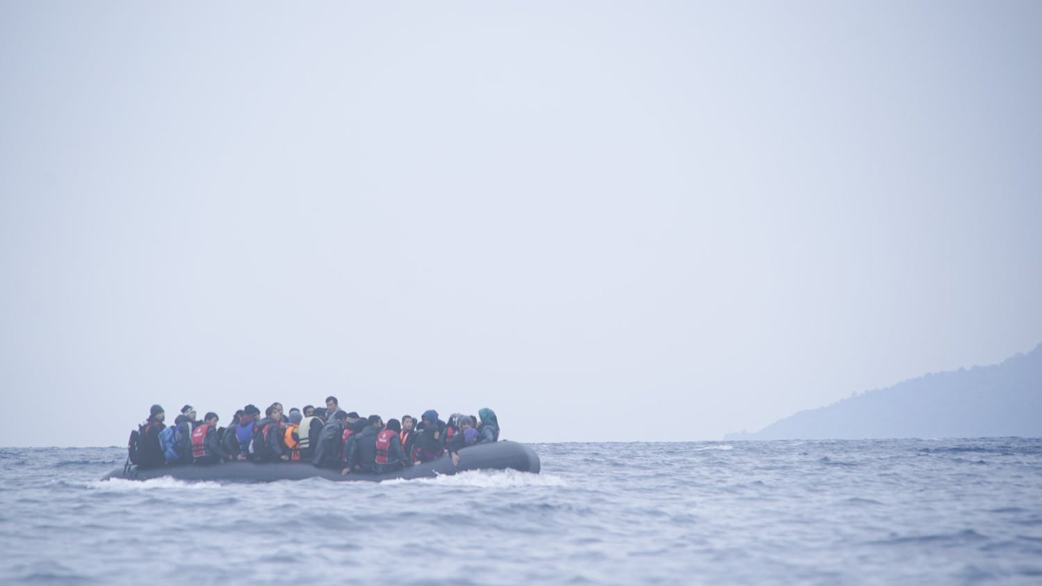 Refugees_on_a_boat_crossing_the_Mediterranean_sea,_heading_from_Turkish_coast_to_the_northeastern_Greek_island_of_Lesbos,_29_January_2016.jpg