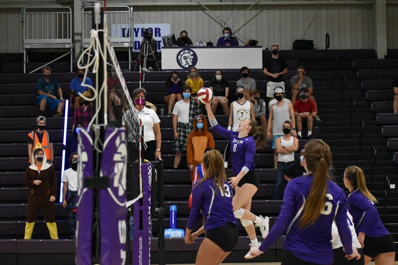 Crazy outfits and loud supporters dot the seats of Odle Arena for volleyball matches.