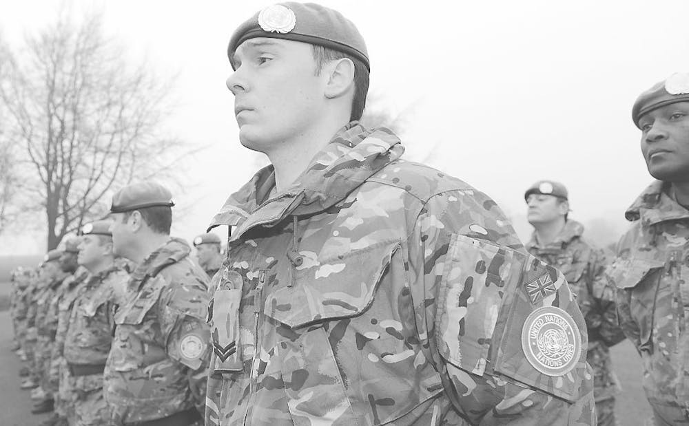 United-Nation-Soldiers-stand-at-command.-Posted-by-Defence-Images.-Creativecommons-Flickr.-.jpg