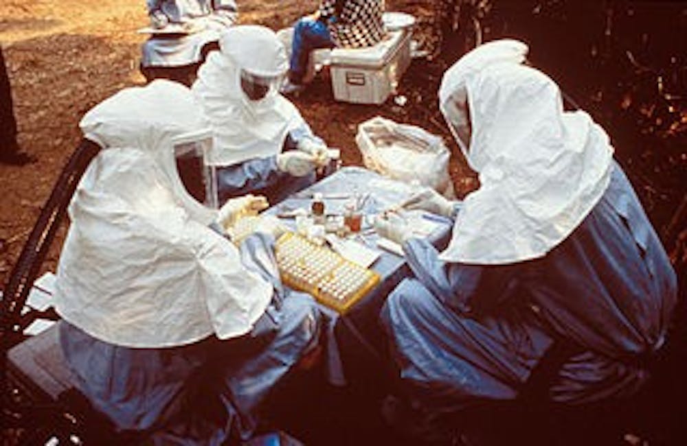 6136_PHIL_scientists_PPE_Ebola_outbreak_1995.jpg