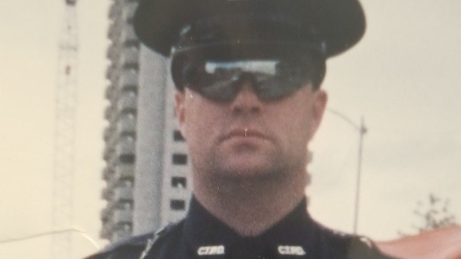 Jeff Wallace during his days serving in metro Detroit, and him today as Chief of Police at Taylor University.