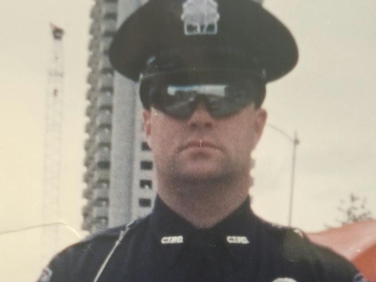 Jeff Wallace during his days serving in metro Detroit, and him today as Chief of Police at Taylor University.