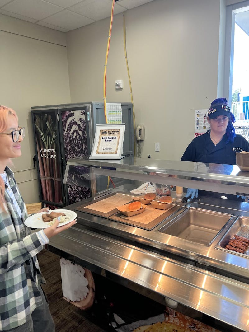 Dining staff serves food at the Euler Science Complex