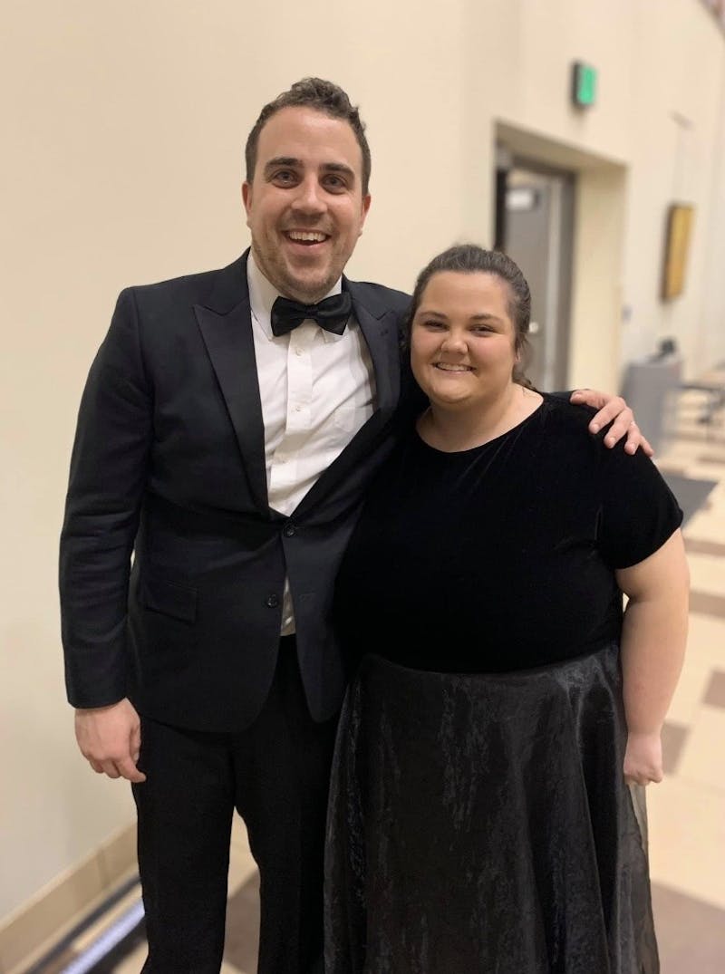 Senior Abigail Kerr, a music education major, poses next to Assistant Professor of Music Choral Ensembles Reed Spencer.