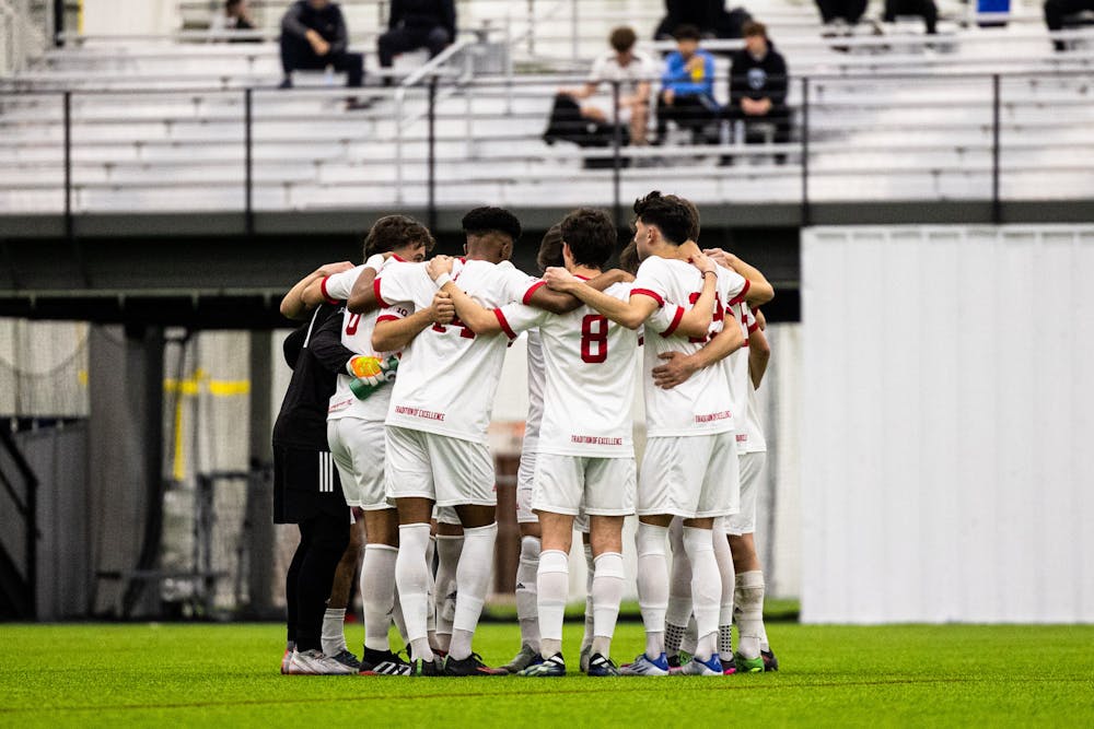 Indiana players huddle during a scrimmage against Louisville on March 5. (HN photo/Kallan Graybill)