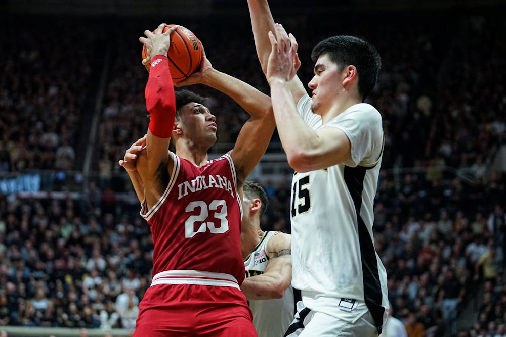 <p>Trayce Jackson-Davis shooting over Zach Edey in the game between Indiana and Purdue on March 5, 2022.﻿ (HN photo/Max Wood)</p>