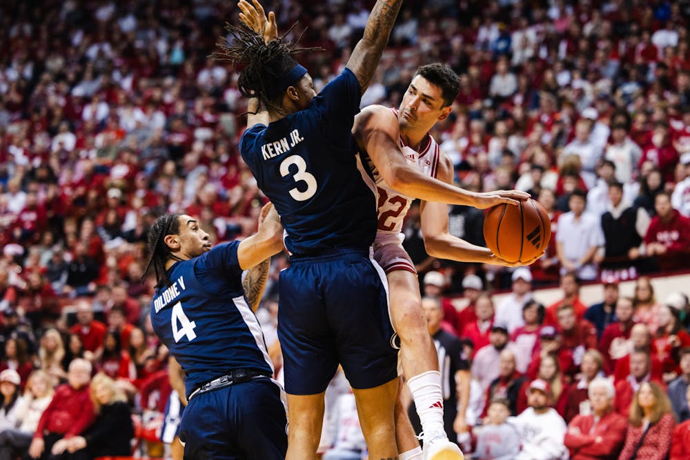 Trey Galloway looks to pass around Penn State's Nick Kern Jr. during Indiana's win over Penn State on Feb. 26, 2025. (HN photo/Kallan Graybill)