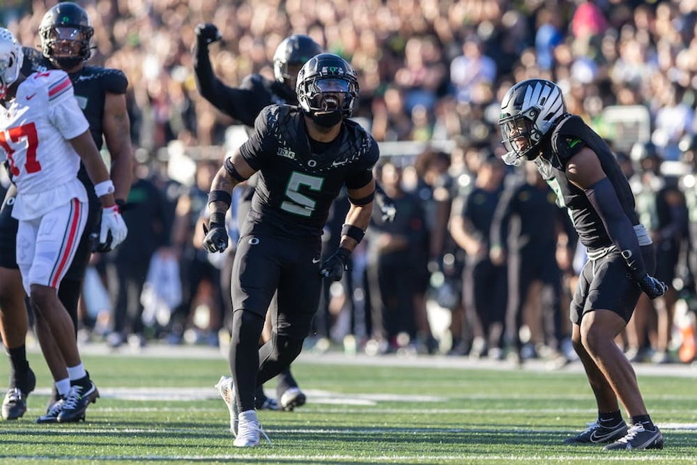 Oregon defensive back Kobe Savage (#5) celebrates a stop for a loss as the No. 3 Ducks face the No. 2 Ohio State Buckeyes in a Big Ten college football game at Autzen Stadium in Eugene on Saturday Oct. 12, 2024. (Sean Meagher/Tribune Content Agency)