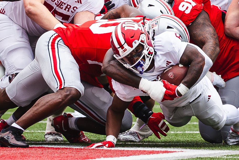 Justice Ellison grimaces while fighting for more yards in a 38-15 loss at No. 2 Ohio State on Nov. 23, 2024. (HN photo/Kallan Graybill)