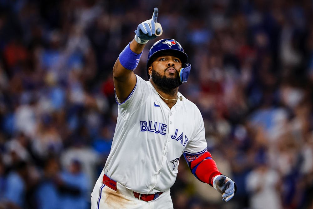 Toronto Blue Jays first baseman Vladimir Guerrero Jr. hits a solo home run at the bottom of the fifth inning of Game 6 of the American League Championship Series on Sunday, Oct. 19, 2025, at Rogers Centre, in Toronto. (Jennifer Buchanan/The Seattle Times/TNS)
