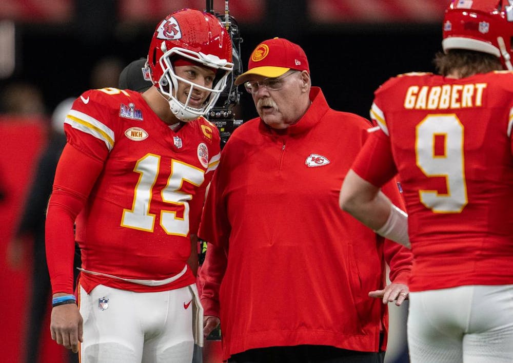 Kansas City Chiefs quarterback Patrick Mahomes, left, confers with coach Andy Reid before the start of Super Bowl LVIII in Las Vegas. (Tammy Ljungblad/Kansas City Star/TNS)