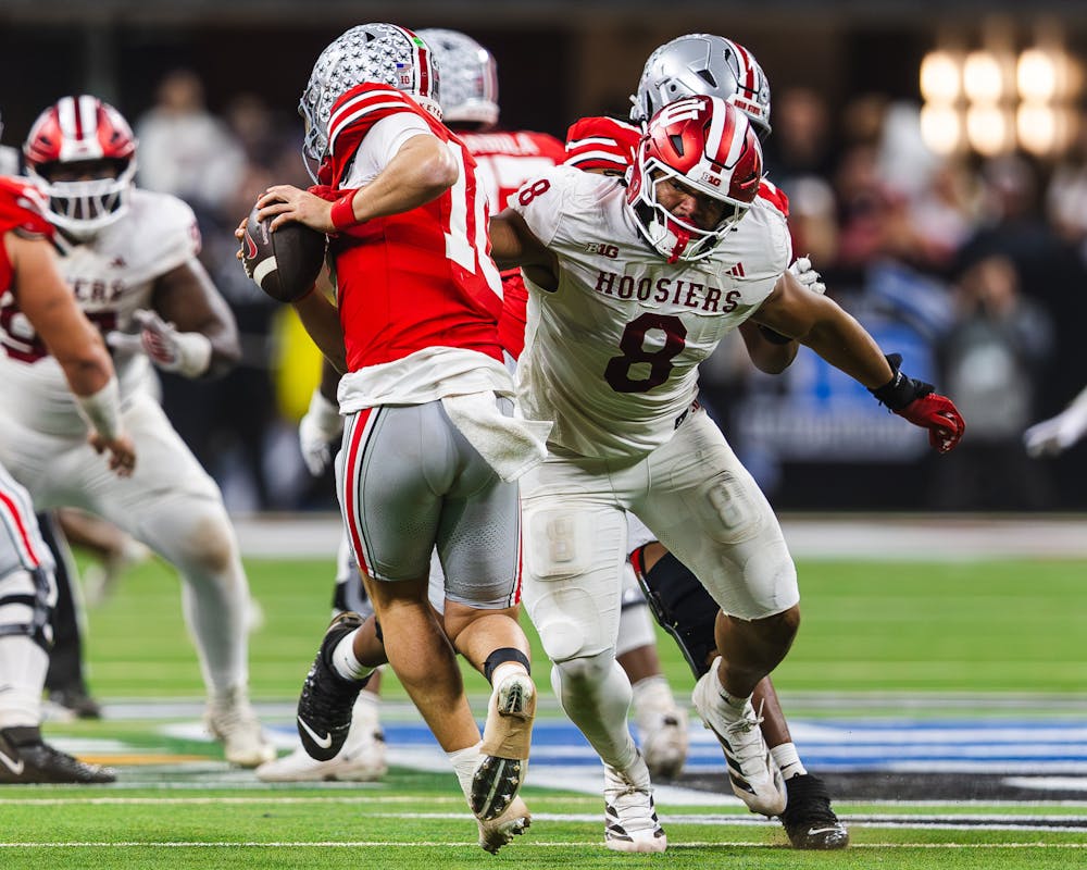 Stephen Daley pressures Ohio State quarterback Julian Sayin during Indiana's win in the Big Ten championship game over Ohio State on Dec. 6, 2025 in Lucas Oil Stadium in Indianapolis. (HN photo/Kallan Graybill)