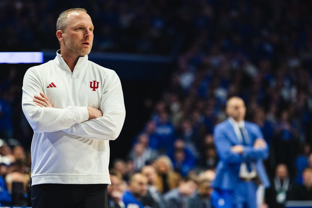 Head coach Darian DeVries watches his team from the sideline during Indiana's loss to Kentucky on Dec. 13, 2025. (HN photo/Kallan Graybill)
