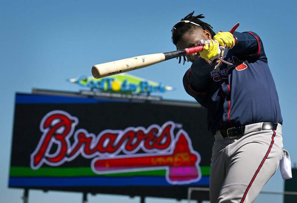 Atlanta Braves right fielder Ronald Acuna Jr. prepares for his batting practice during the first full-squad spring training workout at CoolToday Park, Tuesday, February, 20, 2024, in North Port, Florida. (Hyosub Shin / Hyosub.Shin@ajc.com)