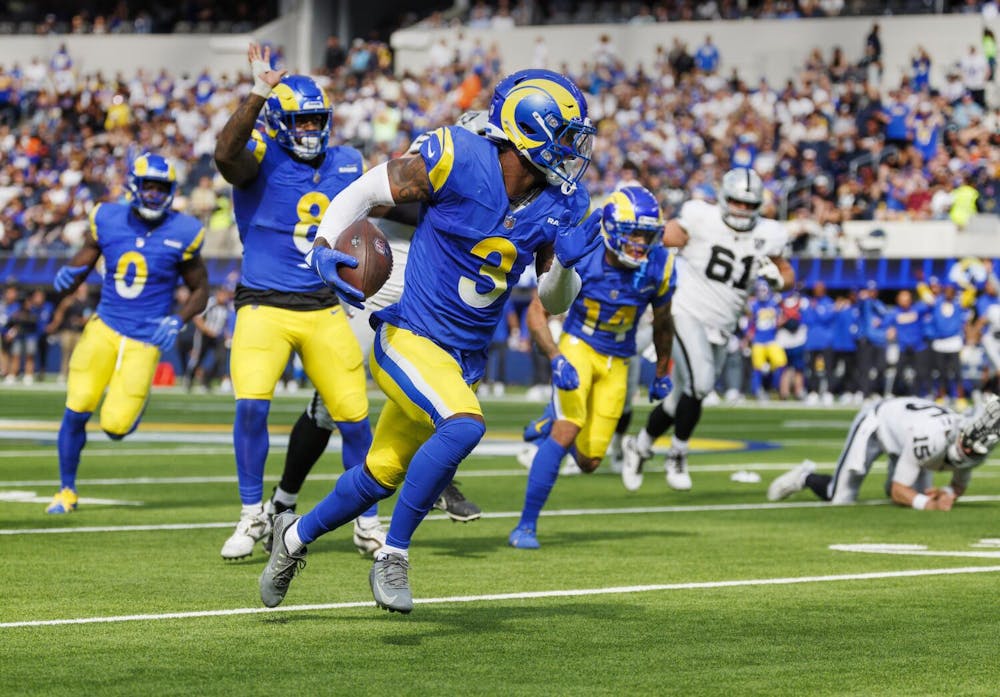 INGLEWOOD, CA - OCTOBER 20, 2024: Los Angeles Rams safety Kamren Curl (3) heads towards the end zone to score on a 33 yard fumble recovery agains the Las Vegas Raiders in the second quarter at So-Fi Stadium on October 20, 2024 in Inglewood, California. (Gina Ferazzi / Los Angeles Times)