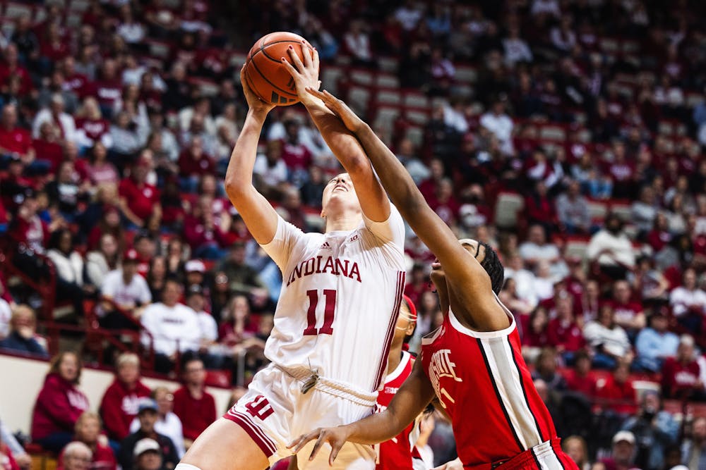 Karoline Striplin fights for a layup in Indiana's 71-61 win over No. 8 Ohio State on Feb. 20, 2025. (HN photo/Kallan Graybill)