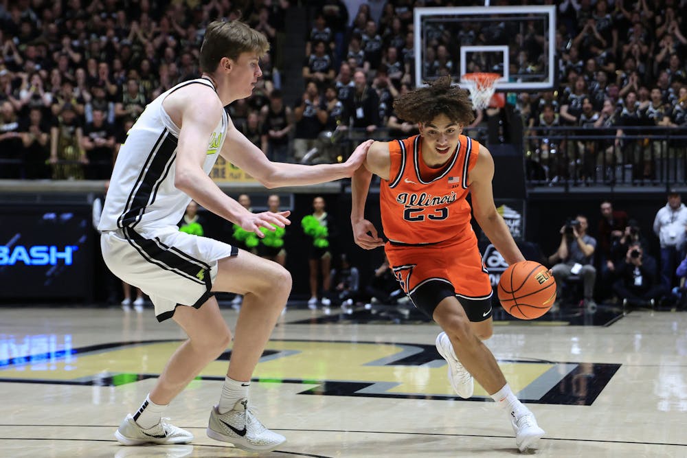 Illinois' Keaton Wagler (23) drives against Purdue's Daniel Jacobsen during the first half at Mackey Arena on Saturday, Jan. 24, 2026, in West Lafayette, Indiana. (Justin Casterline/Getty Images/TNS)