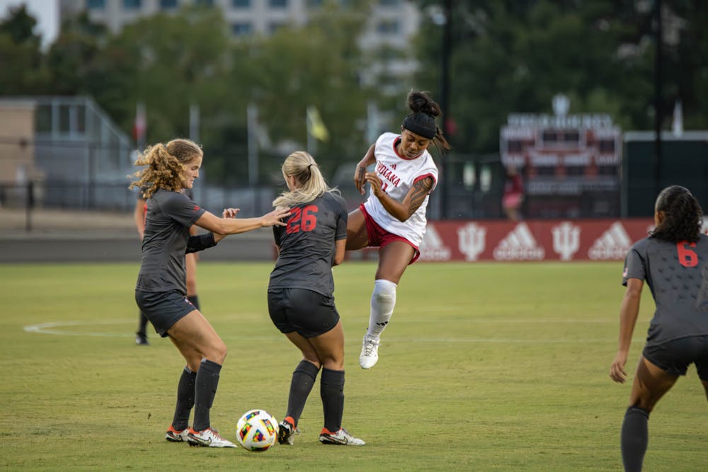 Senior midfielder Hope Paredes flies through the air during Indiana's loss to Ohio State on Sept. 13, 2024. (HN Photo / Carson Burkhart)