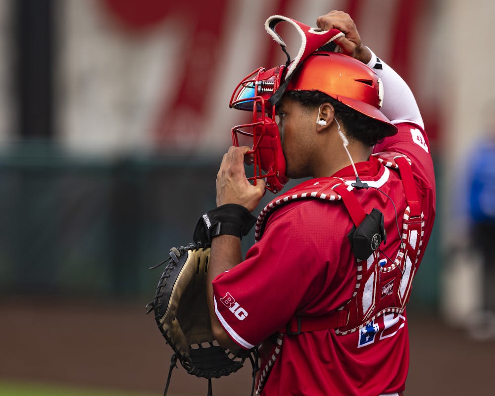 Brayden Ricketts puts on the catcher's mask during Indiana's loss to Indiana State on March 24, 2026. (HN photo/Brady Owen)