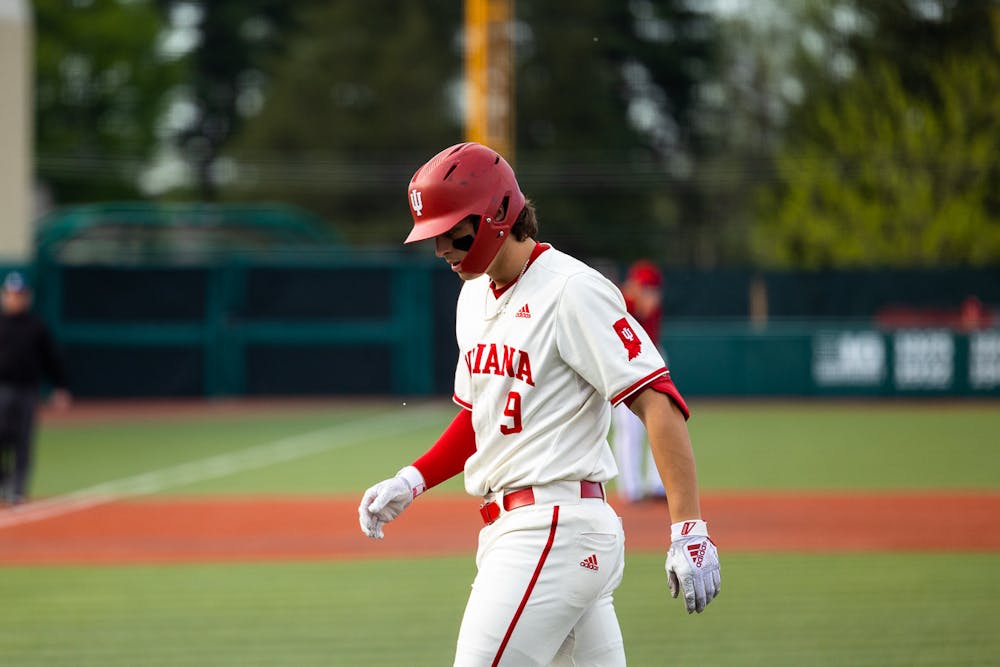 Brock Tibbitts approaches home plate during Indiana's win over Louisville in April. (HN photo/Kallan Graybill)