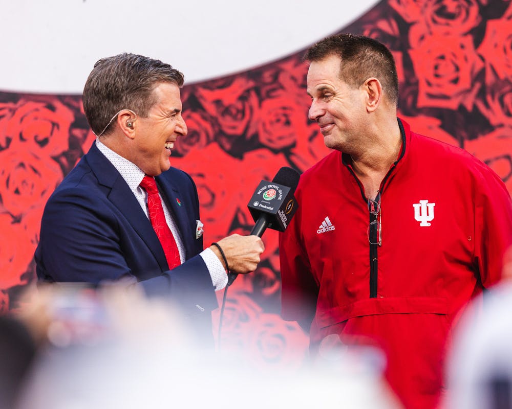 Indiana head coach Curt Cignetti (right) smiles at ESPN's Rece Davis after Indiana's win over Alabama in the Rose Bowl on Jan. 1, 2026. (HN photo/Kallan Graybill)