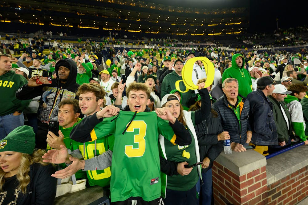 Oregon fans celebrate after a 38-17 win over Michigan at Michigan Stadium. (David Guralnick, Detroit News)