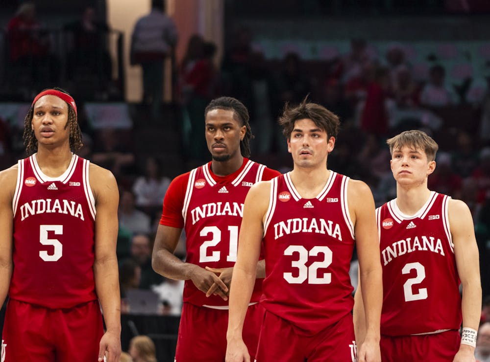 From left: Malik Reneau, Mackenzie Mgbako, Trey Galloway and Gabe Cupps stand together during Indiana's win over Ohio State on Feb. 6, 2024. (HN photo/Ryan Lo)