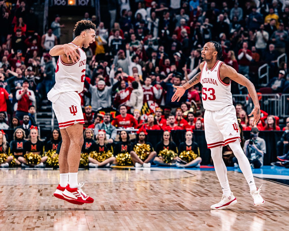 Trayce Jackson-Davis and Tamar Bates celebrate during Indiana's win over Maryland in the Big Ten tournament semifinal on March 10. (HN photo/Cam Schultz)