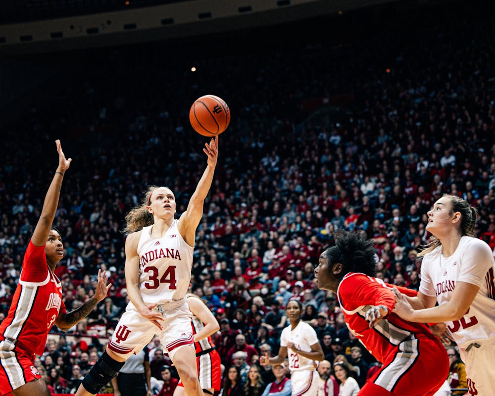 Grace Berger puts a shot up during Indiana's win over Ohio State on Jan. 26. (HN photo/Cam Schultz)