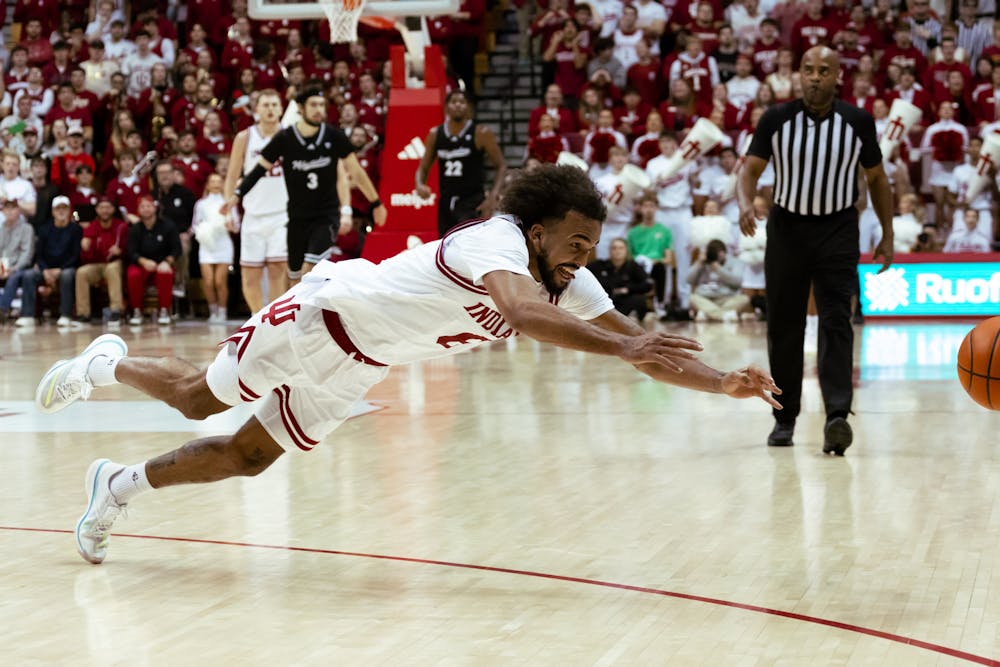 Tayton Conerway dives for a loose ball during Indiana's win over UW-Milwaukee on Nov. 12, 2025. (HN photo/Seamus Head)