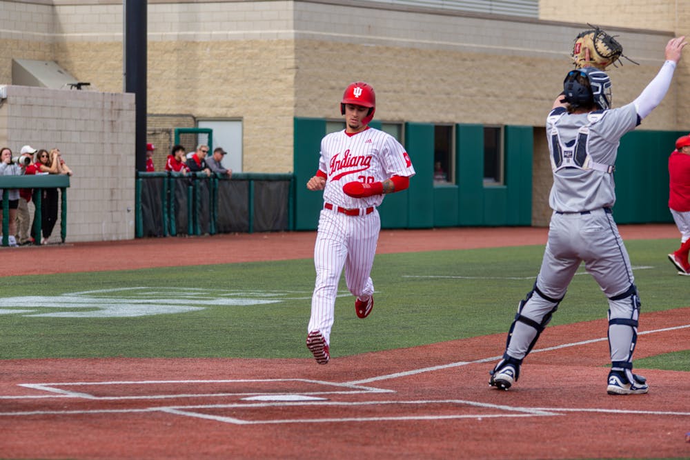 Korbyn Dickerson crosses the plate during Indiana's loss to Xavier on Feb. 26, 2025. (HN photo/Mason Munn)