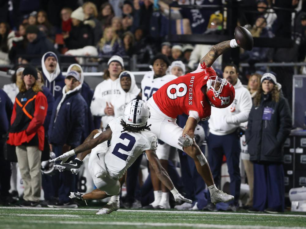 Rutgers wide receiver Kj Duff (8) makes an acrobatic, OBJ-like catch during the fourth quarter against Penn State, Saturday, Nov. 29, 2025 at SHI Stadium in Piscataway, N.J. Penn State won, 40-36. (Andrew Mills | NJ Advance Media for NJ.com | Tribune Content Agency)