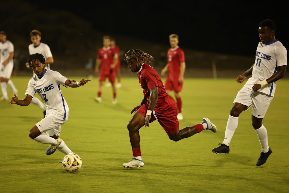 <p>Collins Oduro weaves through Billiken defenders during Indiana&#x27;s win over St. Louis on Sept. 3, 2025. (HN photo/Lindsey Soet)</p>
