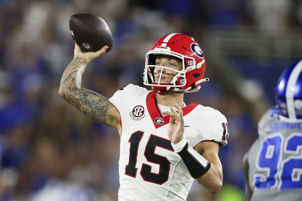 Georgia quarterback Carson Beck (15) attempts a pass during the third quarter against Kentucky at Kroger Field, Saturday, Sept. 14, 2024, in Lexington, Kentucky. Georgia won 13-12. (Jason Getz/The Atlanta Journal-Constitution/TNS)