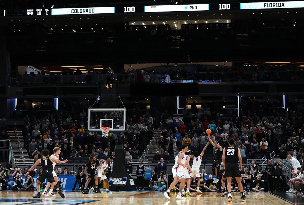 Colorado's KJ Simpson (2) shoots the game-winning shot against Florida during the first round of the NCAA Tournament at Gainbridge Fieldhouse on Friday, March 22, 2024, in Indianapolis. (Dylan Buell/Getty Images/TNS)
