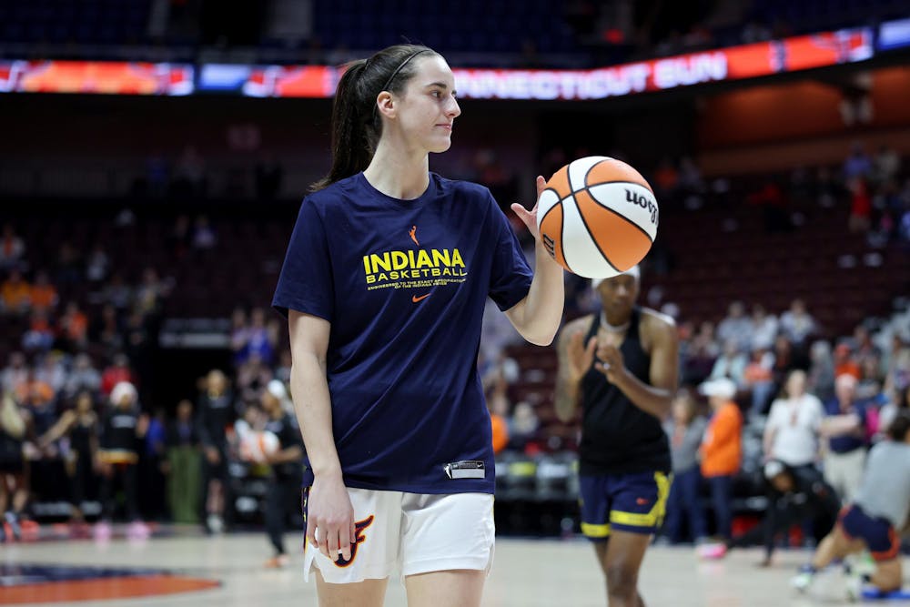 Caitlin Clark of the Indiana Fever warms up prior to a game against the Connecticut Sun  at Mohegan Sun Arena on Tuesday, May 14, 2024, in Uncasville, Connecticut. (Elsa/Getty Images/TNS)