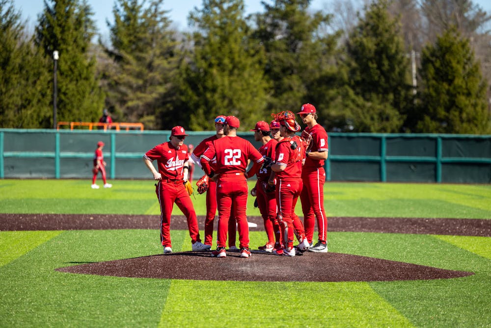 Indiana players gather on the mound during Indiana's loss to Washington on March 8, 2026. (HN photo/Lindsey Soet)