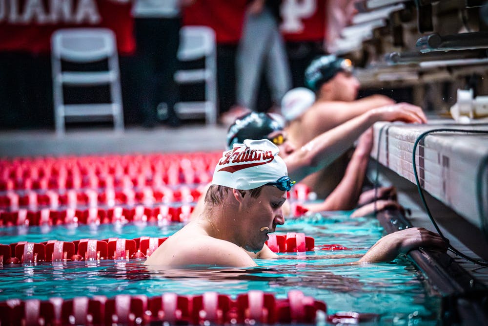 Swimmers take their marks prior to a race during IU's meet against Cincinnati on Dec. 1, 2023. (HN photo/Danielle Stockwell)
