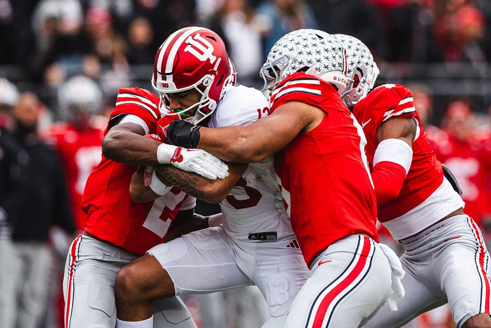 Elijah Sarratt fights through a group of Buckeyes during Indiana's loss to Ohio State on Nov. 23, 2024. (HN photo/Kallan Graybill)