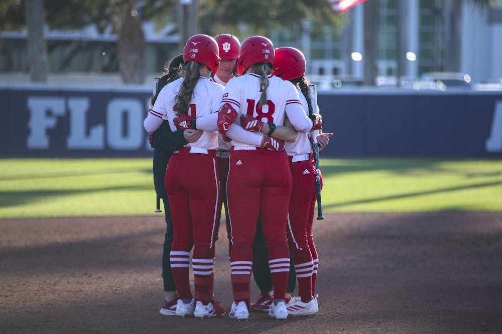 Indiana players huddle during an early season contest in Boca Raton, Florida in 2026. (Photo courtesy of IU Athletics)
