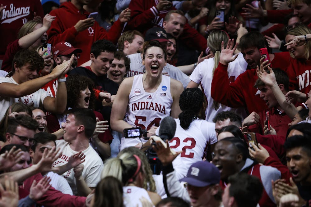 Mackenzie Holmes celebrates with the Assembly Hall crowd after Indiana's win over Oklahoma in the round of 32 of the NCAA Tournament on March 25, 2024. (HN photo/Jaren Himelick)