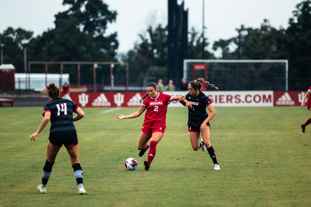 Kennedy Neighbors navigates past defenders during IU's 2-0 win over Louisville on Sept. 7, 2023. (HN photo/Kallan Graybill)