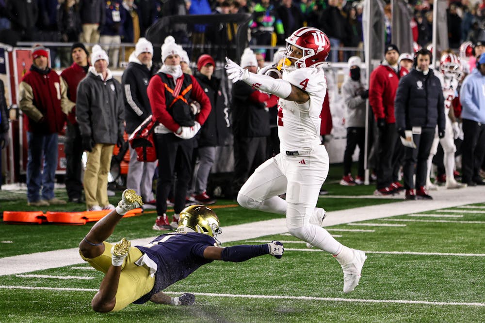 Myles Price jumps over a defender during Notre Dame's win over Indiana on Dec. 20, 2024. (HN photo/Jaren Himelick)