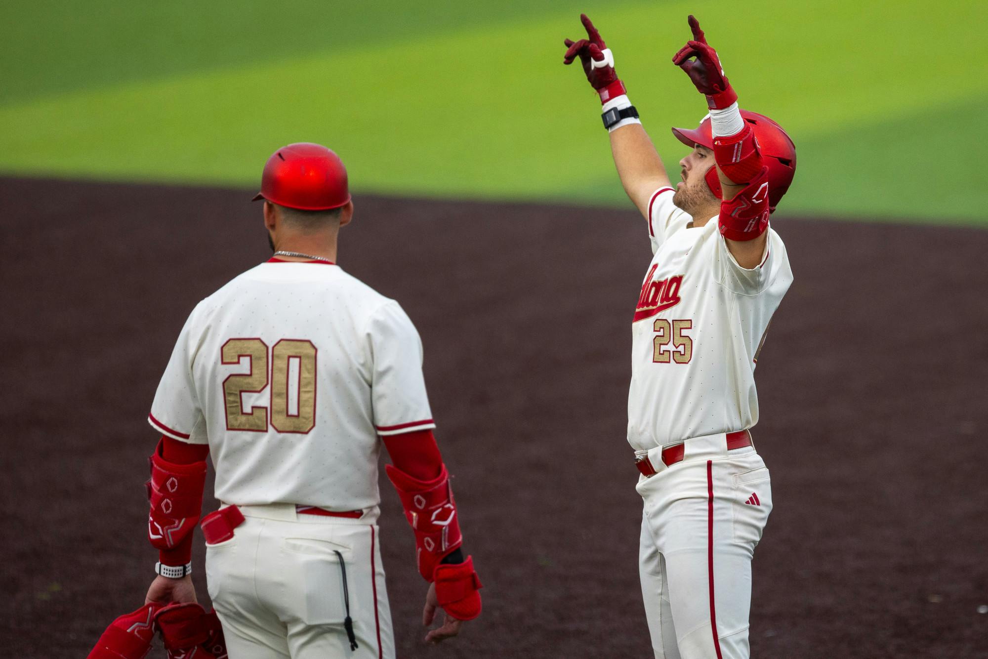 Landen Fry (right) celebrates from first base during Indiana's win over Abilene Christian on April 17, 2026. (HN photo/Lauren McKinney)