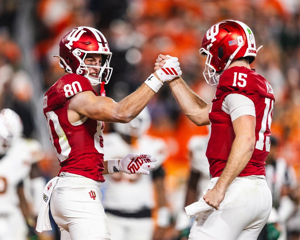 Charlie Becker (left) and Fernando Mendoza celebrate during the College Football Playoff National Championship Game between Indiana and Miami on Jan. 19, 2026. (HN photo/Kallan Graybill)