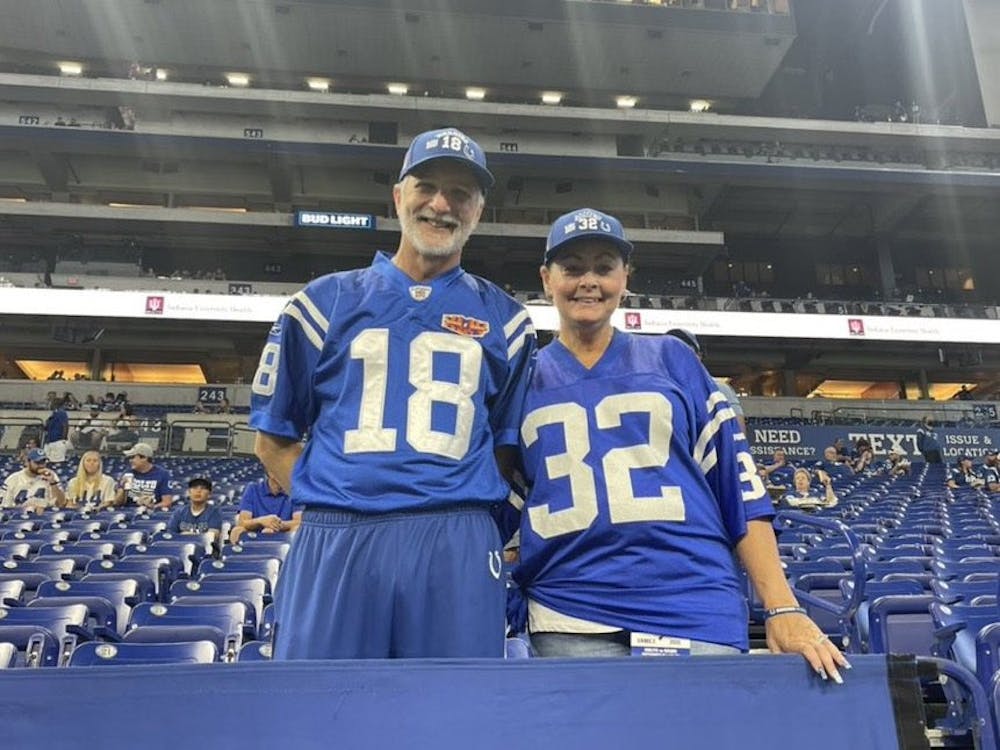 Colts fan Rick Stevens, also known as "Colts Caveman," attends a game with his wife Joanie. (Photo courtesy of Rick Stevens)