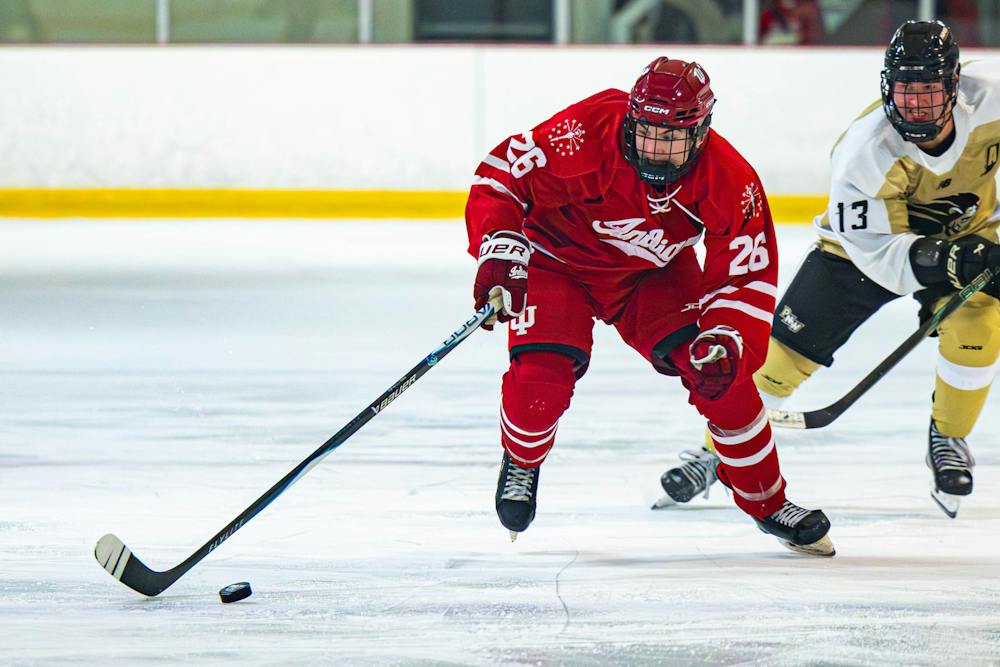 BLOOMINGTON, INDIANA — OCTOBER 16, 2026 — Nolan Moore handles the puck during a game against the Purdue Northwest Lions at Franklin Southern Ice Arena in Bloomington, Indiana — (Photo by Brady Owen / The Hoosier Network)