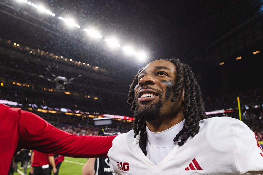 Omar Cooper Jr. looks up at the stands after Indiana's win in the Big Ten championship game over Ohio State on Dec. 6, 2025 in Lucas Oil Stadium in Indianapolis. (HN photo/Kallan Graybill)